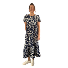 Load image into Gallery viewer, Navy Blue Cow print dress with puff sleeves and a tucked in waistband (A167)