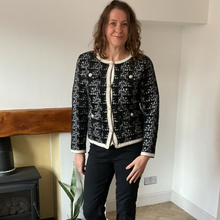 Load image into Gallery viewer, Black Tweed Style Pearl Button Jacket | Waist-Length Elegant Jacket | One Size Fits UK 10–14 | Pamper Yourself now A181