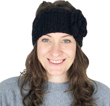 Load image into Gallery viewer, Black woollen machine knitted headband with flower. Warm winter headband