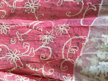 Load image into Gallery viewer, Bright pink with black flowers and embroidered white flowers with tassels