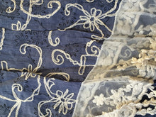 Load image into Gallery viewer, Blue with black flowers and embroidered white flowers with tassels