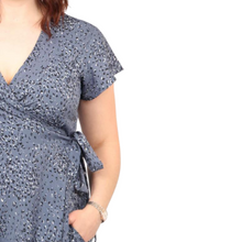 Load image into Gallery viewer, Blue Speckled Animal Print Wrap Dress with cap sleeves and pockets. (A145)