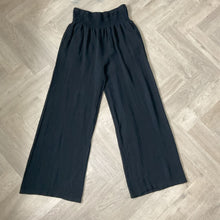 Load image into Gallery viewer, Linda Classic Black Shirred Waistband Palazzo Trousers with Pockets | UK 10–16
