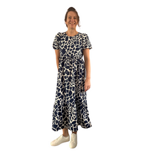 Load image into Gallery viewer, Navy Blue Cow print dress with puff sleeves and a tucked in waistband (A167)
