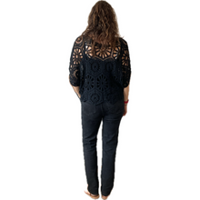 Load image into Gallery viewer, Black Big Daisy crochet top with undervest.
