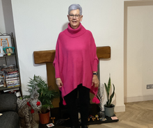 Load image into Gallery viewer, Fuchsia pink Oversized Cowl Neck Poncho Jumper with Tassels | Flattering One Size UK 12–24
