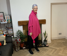 Load image into Gallery viewer, Fuchsia pink Oversized Cowl Neck Poncho Jumper with Tassels | Flattering One Size UK 12–24
