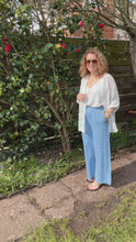 Load and play video in Gallery viewer, Ashley Light Denim 3 Gold Button Trousers | Elastic Waist UK 10–14
