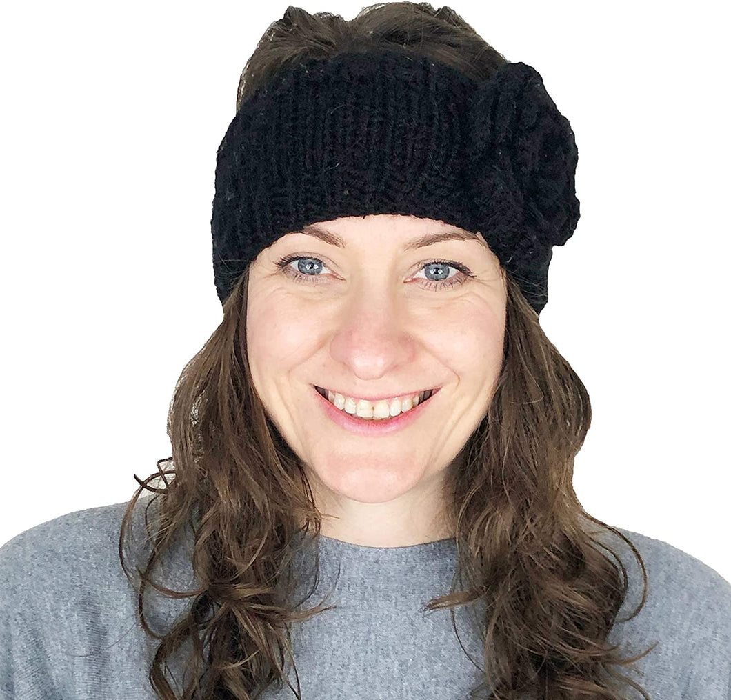 Black woollen machine knitted headband with flower. Warm winter headband