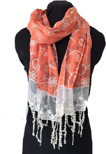 Load image into Gallery viewer, Orange with black flowers and embroidered white flowers with tassels
