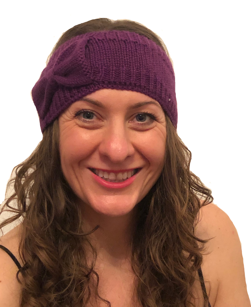 Purple woollen machine knitted headband with bow. Lovely to keep your head warm in the winter.
