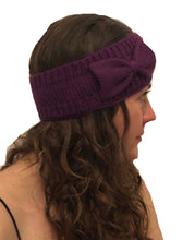 Load image into Gallery viewer, Purple woollen machine knitted headband with bow. Lovely to keep your head warm in the winter.
